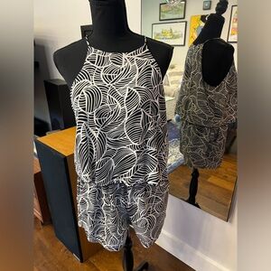 Fun black and white pop over romper. With POCKETS! Size L.